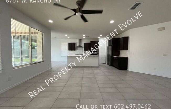 8757 W RANCHO Drive