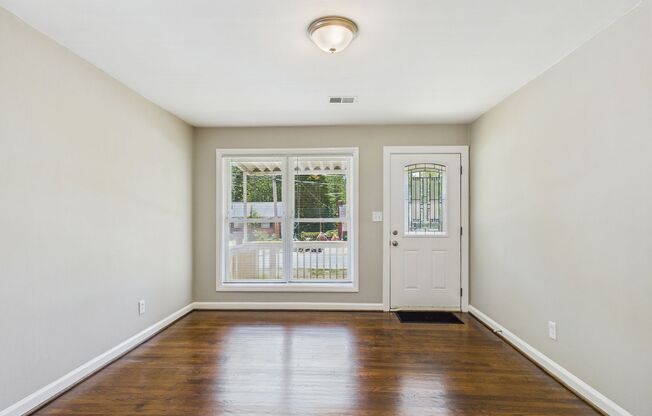 Updated home with New Kitchen, Hardwood Floors, Fenced!