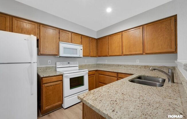 Spacious 2 Story Townhome + finished basement in a great SE location.