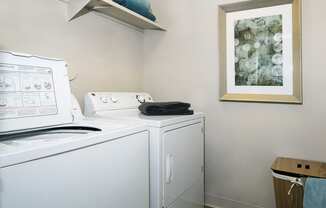 Washer and dryer in a laundry room  at Avery Park in Englewood, CO