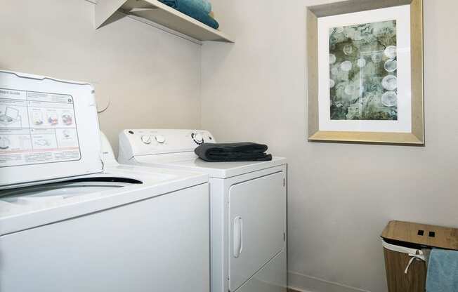 Washer and dryer in a laundry room  at Avery Park in Englewood, CO