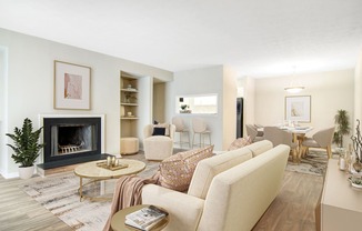 Affinitee at Stone Mountain Apartments photo of a living room with a couch and a fireplace