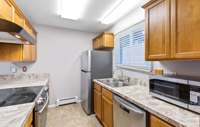 Charming 2-Bedroom Condo with Private Patio and Garage!