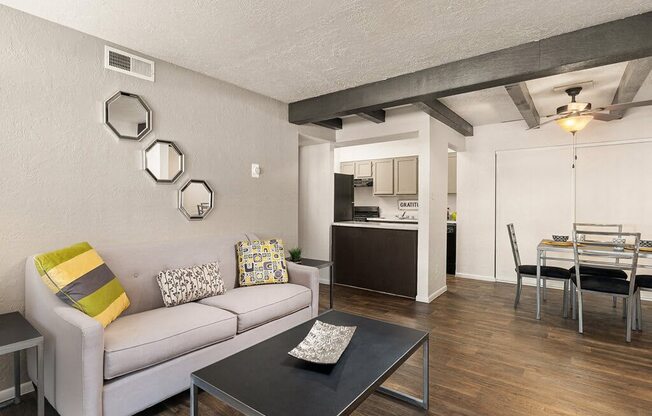 a living room with a couch and a table