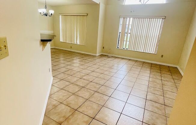 Beautiful 4 Bed / 2 Bath Single-Family Home with Fenced Yard & Screened Patio