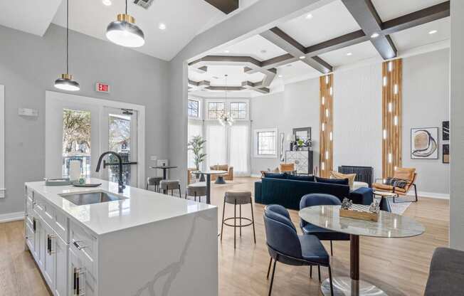a living room with a kitchen and a dining room