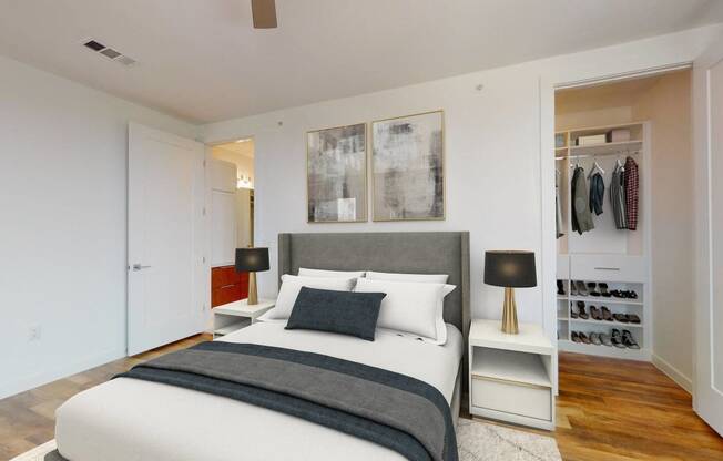 a bedroom with a bed and a closet