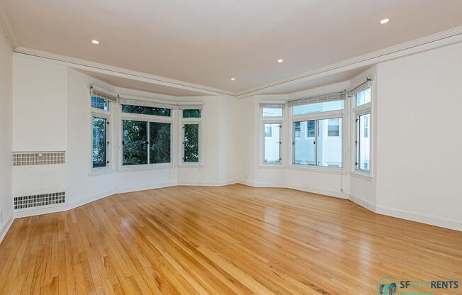 Pacific Heights: Corner Apartment w/ Formal Dining Room & Shared Roof Deck