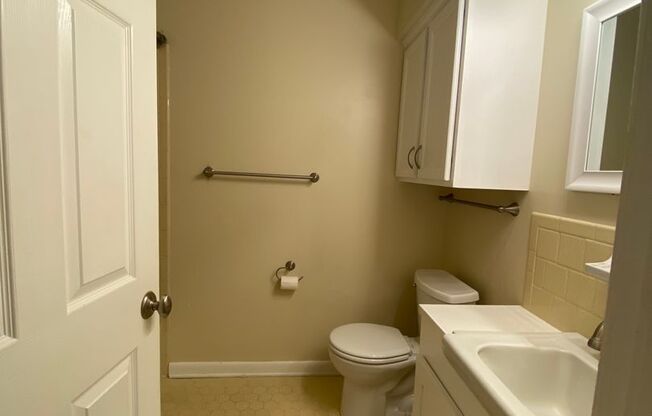 3 Bedroom , 1.5 Bathroom Brick home with carport and fenced yard, with shed,