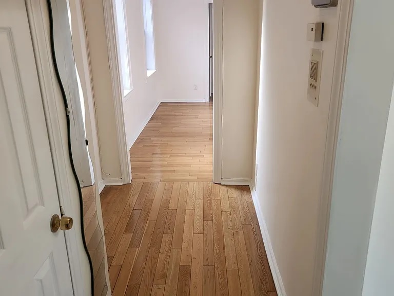 61-40 Saunders St.