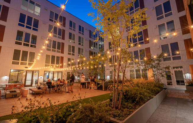 The Warren Apartments outdoor patio at night