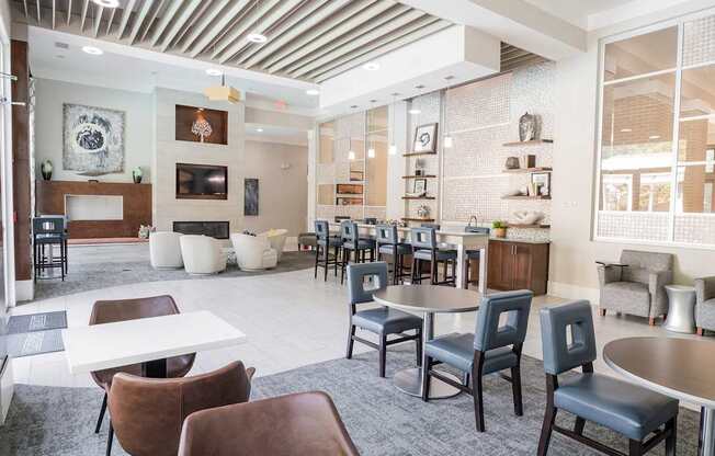 A modern dining room with a white table and brown chairs.