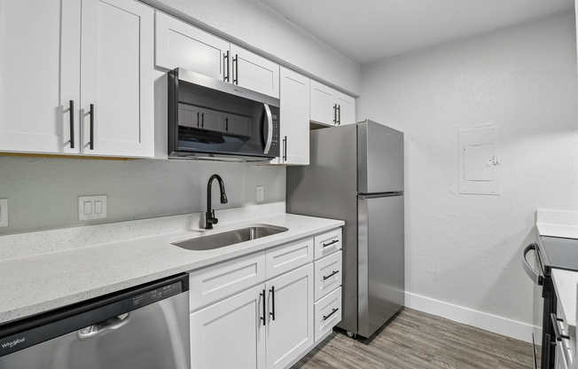 Granite counter tops, new cabinets, and stainless appliances!