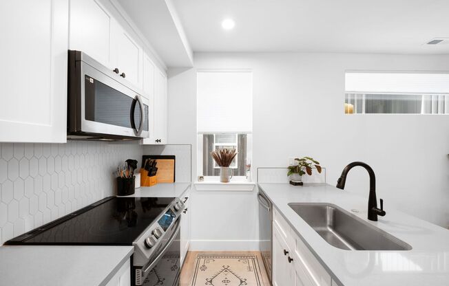 LUX 3BD, 2.5BA University Hills Townhome with 1-Car Garage