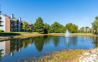 Apartment Homes at Pelican Cove Overlooking the Pond with Fountain