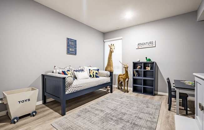 Bedroom with recessed lighting, wood inspired flooring