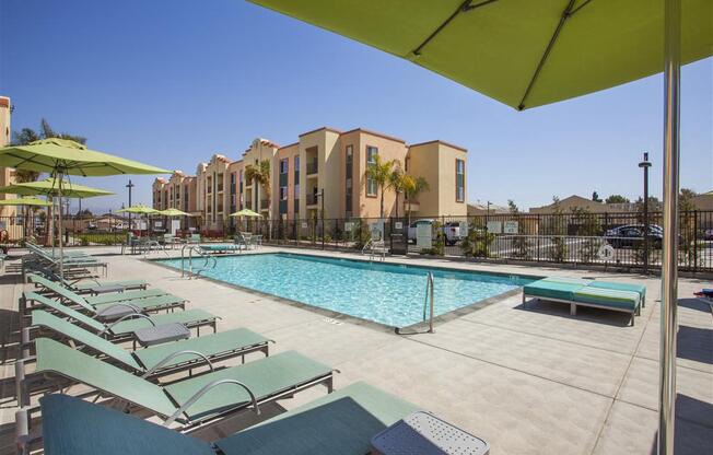 Swimming Pool And Relaxing Area at Hancock Terrace Apartments, Santa Maria, CA