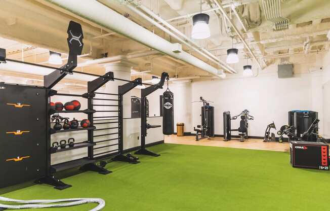 Indoor fitness area at The May, featuring a variety of state of the art gym equipment.