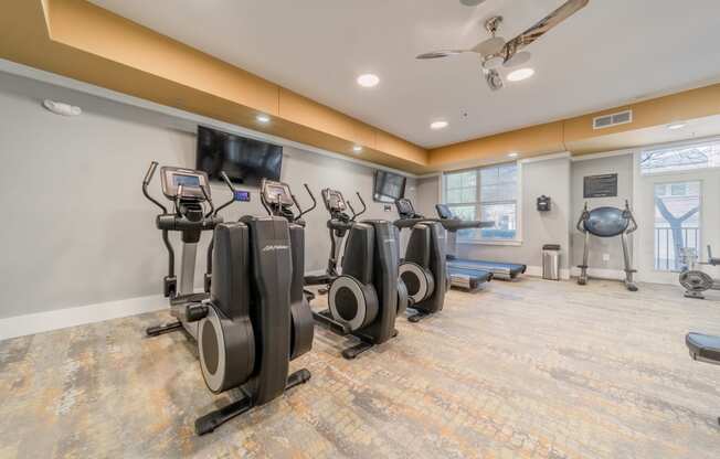 the gym at the whispering winds apartments in pearland, tx