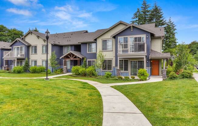 Property Grounds with Walking Path, Grass and Apartment Exterior