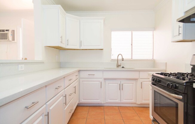 view of kitchen with sink and window in the middle