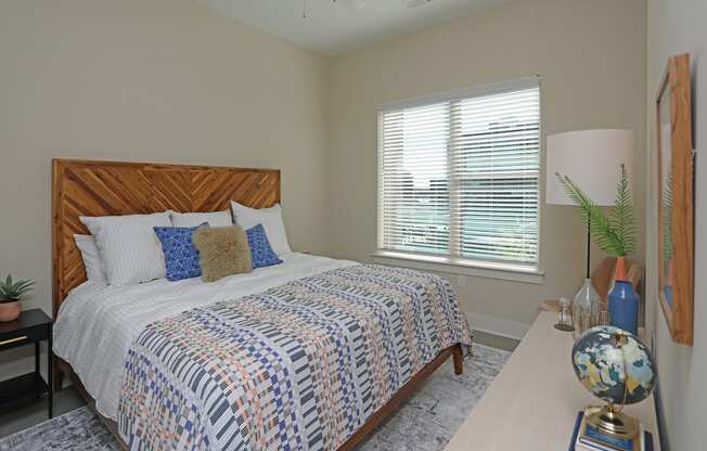 Bedroom With Expansive Windows at Link Apartments® Innovation Quarter, Winston Salem, 27101