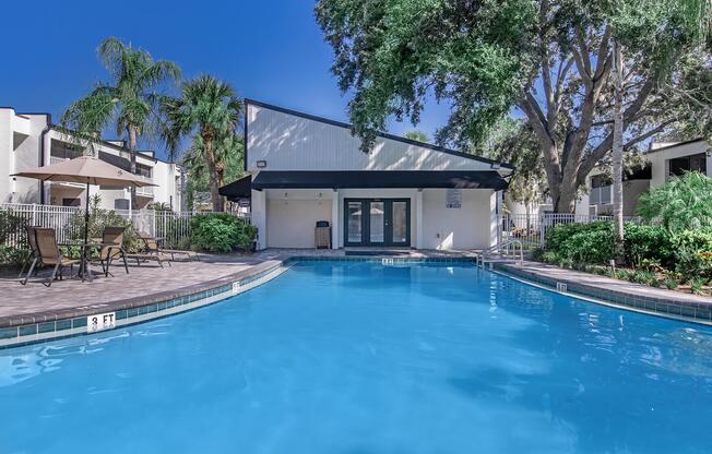 a house with a large pool of water