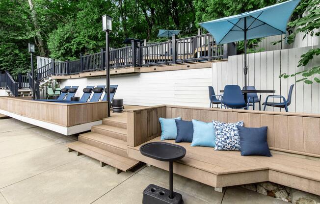 a chair sitting in front of a blue bench