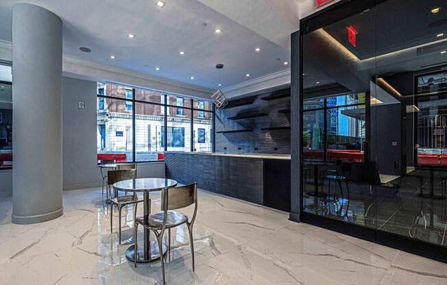 3thirty3 new rochelle ny apartment high rise photo of amenity area with pub seating and marble flooring
