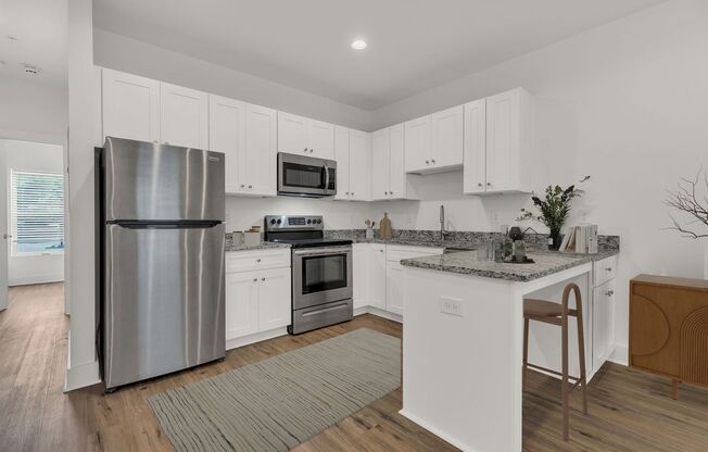 1 Bed 1 Bath Condo Minutes to Downtown w/ Water, W/D & Dedicated Parking $1150