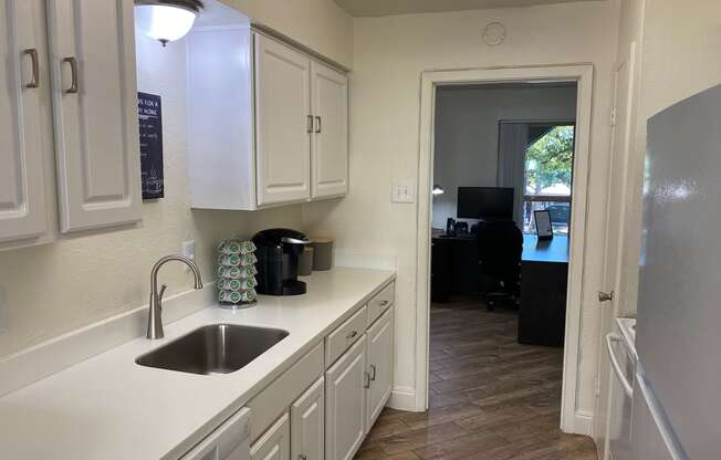 This is a photo of Leasing Office kitchen/2 bedroom, 2 bath 1116 quare foot "C"  floor plan at Woodbridge Apartments in Dallas, Texas.