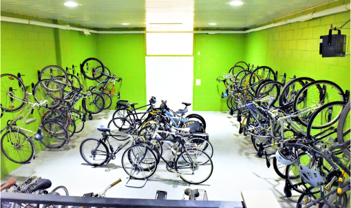 a bunch of bikes parked in a room