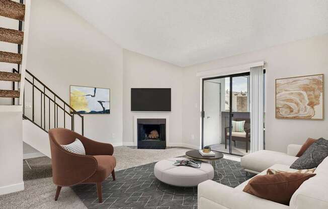 A living room with a fireplace and a television.