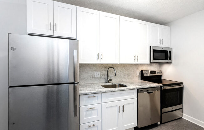 Kitchen with Granite Countertops at Connecticut Plaza Apartments, 20008.