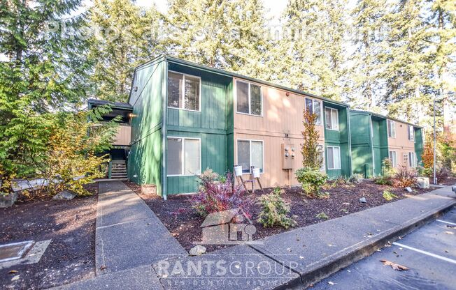 Lovely, wooded 2-bedroom apartment with a large private deck and in-unit washer & dryer!