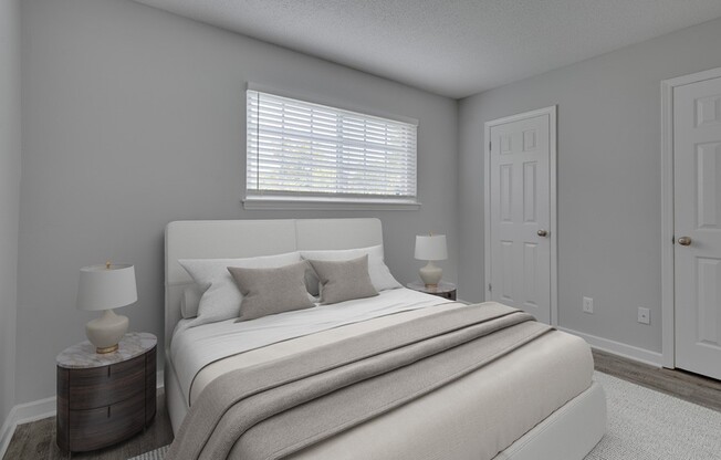 Step into the serenity of a beautifully designed bedroom at Icon Downtown Durham. Modern finishes and natural light create a perfect retreat. Elevate your living experience in this stylish space. Schedule a tour today!