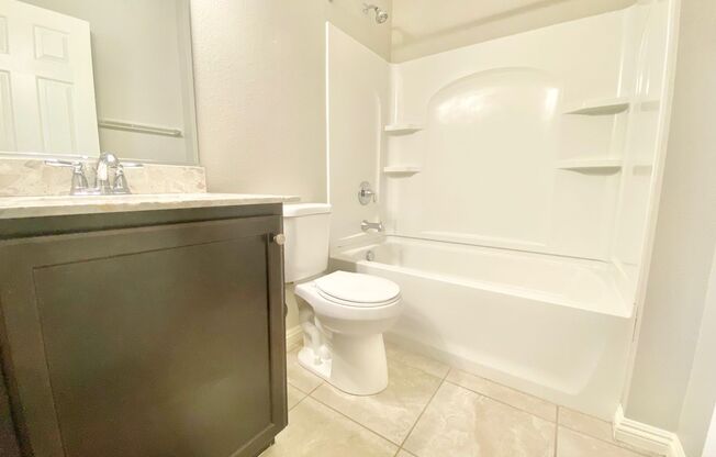 STUNNING 4 BEDROOM, 2.5 BATHROOM HOME WITH 2-CAR GARAGE LOCATED IN A GATED COMMUNITY!