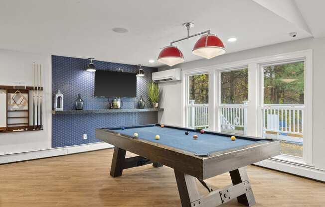 Game Room With Billiards And Shuffleboard at Heritage at the River, Manchester