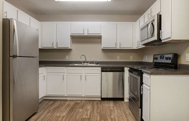 Spacious Kitchen with Pantry Cabinet at Ridgeland Place Apartment Homes, Ridgeland, MS, 39157