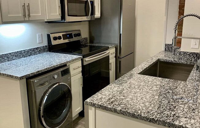 Kitchen with Stainless Steel Appliances and Granite Countertops, San Sofia Apartments, Cleveland, OH, 44113