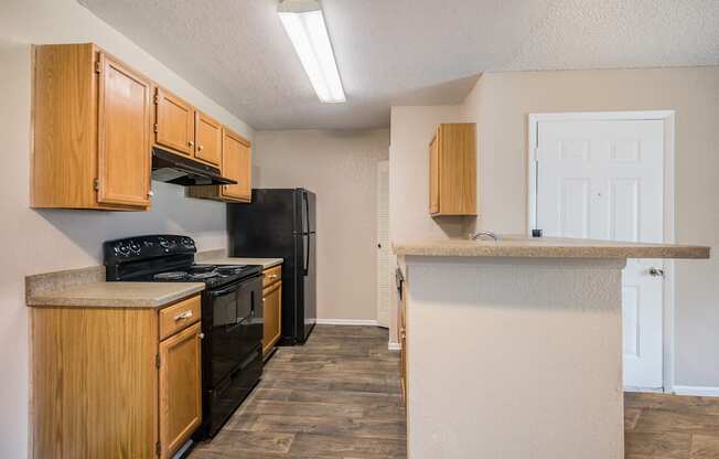 Model Kitchen at Reflections Apartment Homes in Gainesville, Florida, FL