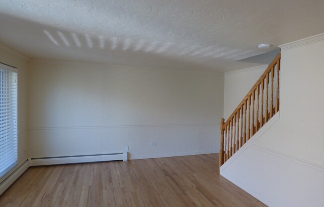 CHEESMAN PARK! TWO STORY CONDO! ADDITIONAL HALF BATH ON MAIN LEVEL! PARKING, HARDWOODS, STORAGE!