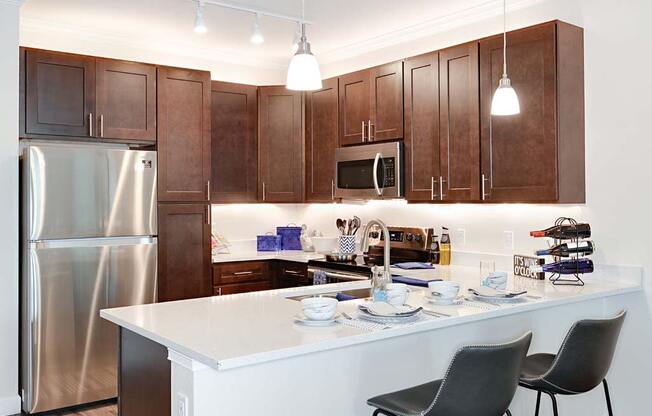 Gourmet Kitchen With Island at The Oasis at Cypress Woods, Fort Myers