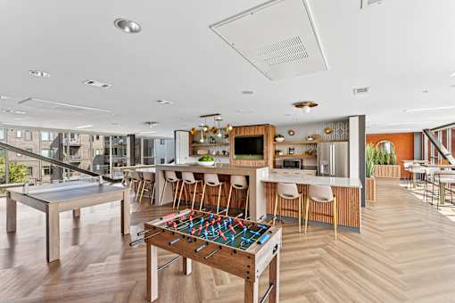 Clubroom with foosball, pool table, ping pong table, and games!