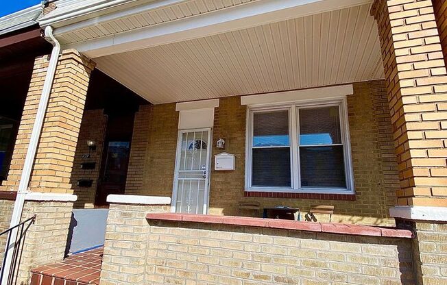 2-Bedroom Townhome with Finished Basement + Covered Front Porch & Parking