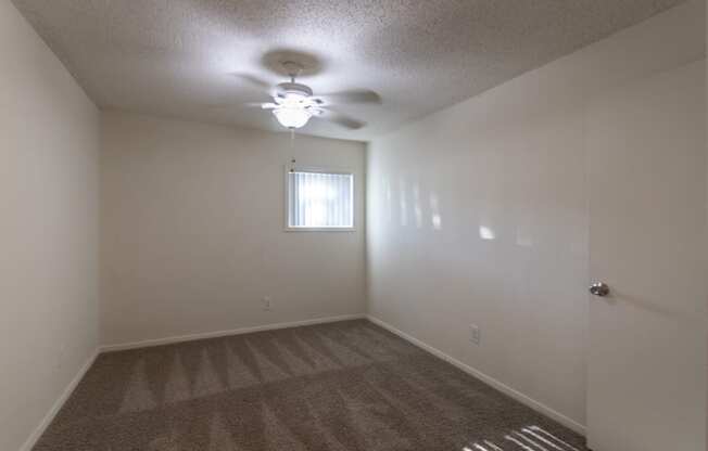 This is a photo of the second bedroom in the 871 square foot 2 bedroom, 2 bath apartment at Princeton Court Apartments in the Vickery Meadow neighborhood of Dallas, Texas.