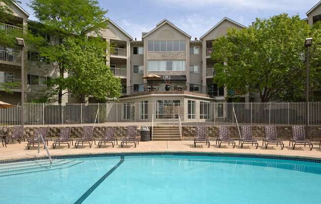 Outdoor pool with lounge chairs