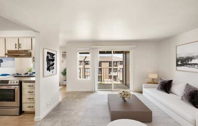 a living room with a white couch and coffee table  at Brix, Walla 