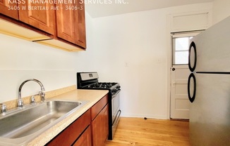 3406 W BERTEAU AVE