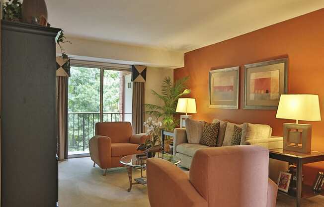 Large living room with private balcony at Liberty Gardens Apartments, Maryland, 21244